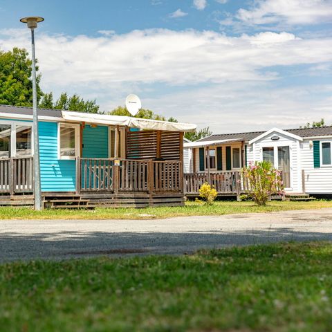 Mobilheim 6 Personen - Mobilheim | Comfort | 3 Schlafz. | 6 Pers. | Überdachte Terrasse | 1 Bad | Klimaanlage | TV