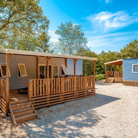 Mobilheim 8 personen - Mobilheim | Comfort | 4 Zi. | 8 Pers. | Erhöhte Terrasse | 2 Bäder | Clim.