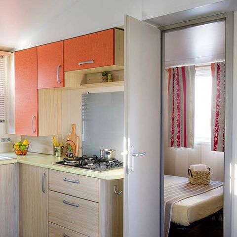 Mobilheim 4 Personen - Comfort | 2 Schlafz. | 4 Pers. | Erhöhte Terrasse | 1 Bad | TV