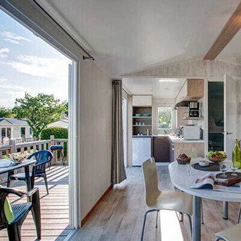 Mobilheim 4 Personen - Comfort | 2 Schlafz. | 4 Pers. | Erhöhte, nicht überdachte Terrasse | TV