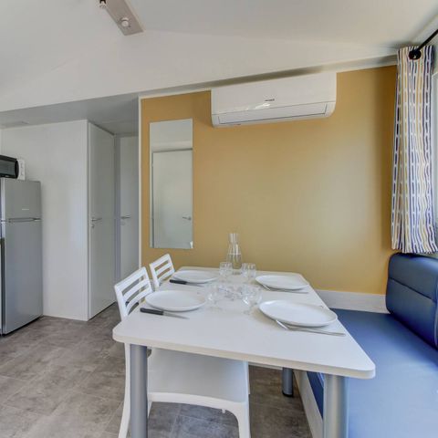 Mobilheim 4 Personen - Mobilheim | Comfort | 2 Zi. | 4 Pers. | Erhöhte Terrasse | 1 Bad | Clim.