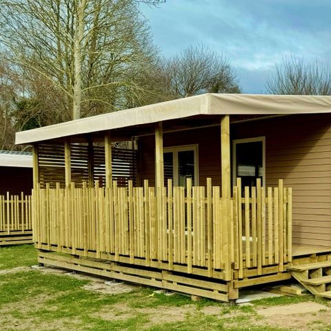 Mobilheim 4 Personen - Komfort 32m² (2 Zimmer) darunter überdachte Terrasse + TV + BBQ