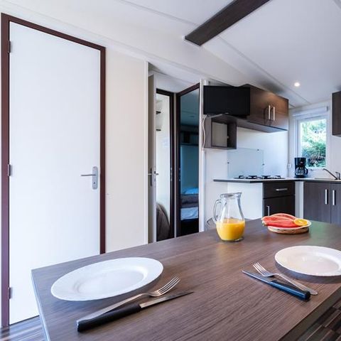 Mobilheim 2 Personen - Mobilheim Strand 18.6m² (+ 10 Jahre) (1 Zimmer) + Halbüberdachte Holzterrasse + TV 2 Pers.