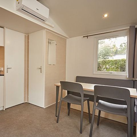 Mobilheim 4 Personen - Comfort XL | 2 Zi. | 4 Pers. | Erhöhte Terrasse | Klim.