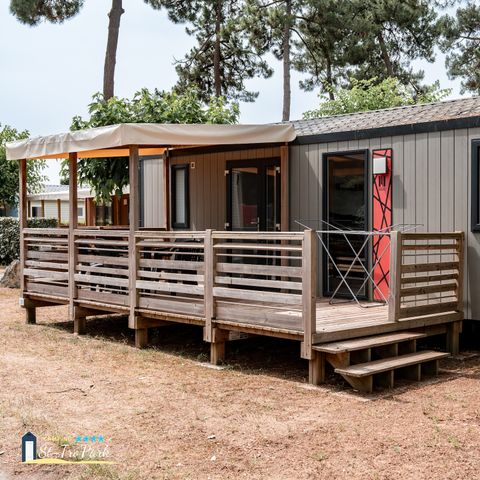Mobilheim 6 personen - Mobilheim Premium 33m² (3 Zimmer) + Geschirrspülmaschine + Bett 160 + Halbüberdachte Terrasse 15m².