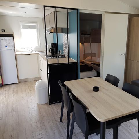Mobilheim 5 Personen - Mobilheim Premium 32 m² 2 Zimmer + 12m² halbüberdachte Terrasse (9m²) + TV + Klimaanlage 4/5 Pers.