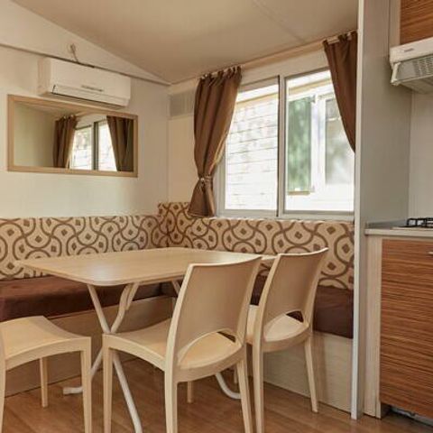 Mobilheim 4 Personen - Mobilheim | Classic | 2 Schlafz. | 4 Pers. | Hochterrasse | 2 Bäder | Klimaanlage | TV