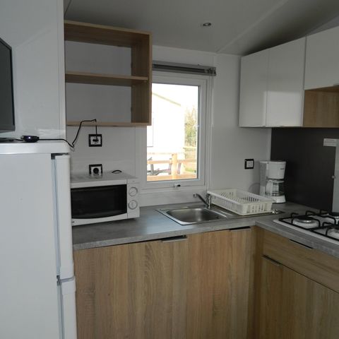 Mobilheim 8 Personen - Mobilheim „Confort“ 28 bis 35 m² (3 Schlafzimmer) + Terrasse mit Meerblick für 6–8 Personen