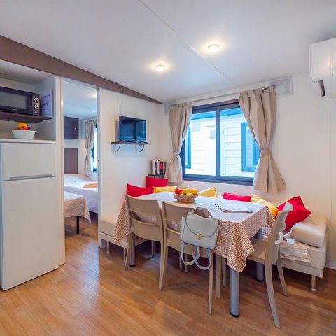 Mobilheim 6 personen - Premium | 3 Schlafz. | 6 Pers. | Erhöhte Terrasse | Klimaanlage | TV