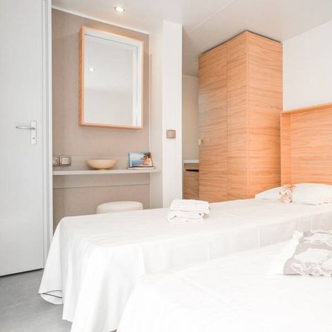 Mobilheim 4 Personen - Mobilheim | Ultimate | 2 Schlafz. | 4 Pers. | Erhöhte Terrasse | 2 Bäder | Klima.