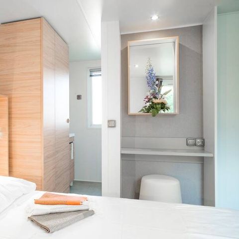 Mobilheim 4 Personen - Mobilheim | Ultimate | 2 Schlafz. | 4 Pers. | Erhöhte Terrasse | 2 Bäder | Klima.