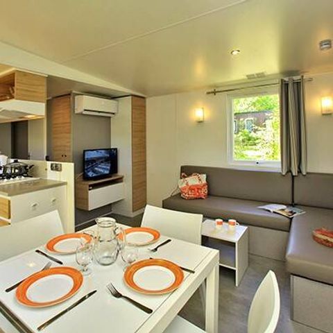 Mobilheim 6 personen - Mobilheim | Premium Exclusive | 3 Zi. | 6 Pers. | Terrasse Lounge | Jacuzzi | 2 Bad | Klima | TV