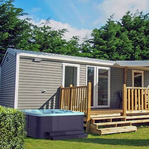 Mobilheim 6 personen - Mobilheim | Premium Exclusive | 3 Zi. | 6 Pers. | Terrasse Lounge | Jacuzzi | 2 Bad | Klima | TV