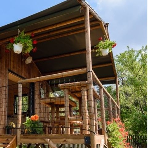Chalet 5 Personen - Cottage premium (2022) am Flussufer, 2 Zimmer, überdachte Terrasse 5 Pers.