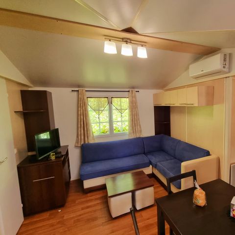 Mobilheim 6 Personen - Premium 22-28m² - 2 Schlafzimmer + TV + Überdachte Terrasse & Einwegbettwäsche vorhanden