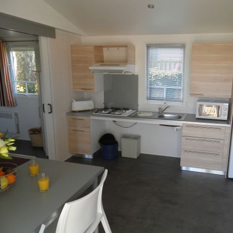 Mobilheim 4 Personen - Standard 32m² - 2 Zimmer + nicht überdachte Terrasse - PMR