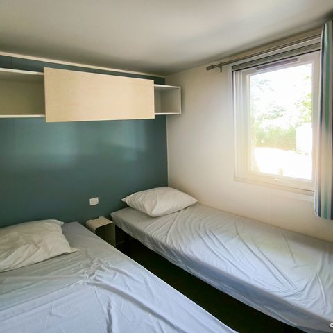 Mobilheim 4 Personen - Standard 32m² - 2 Zimmer + überdachte Terrasse 12m².