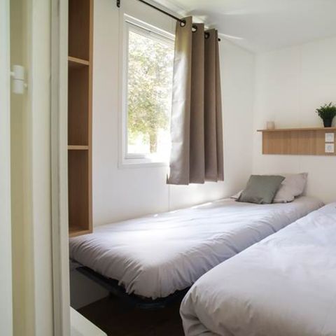 Mobilheim 4 Personen - Nest29 30,8 m²- 2 Zimmer + Überdachte Terrasse + TV