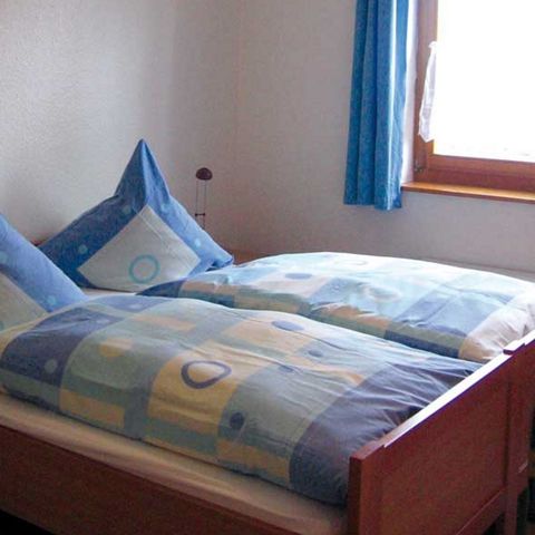 Bungalow 3 Personen - Gemütliche Wohnung mit Ofen, im grünen Bruchttal gelegen