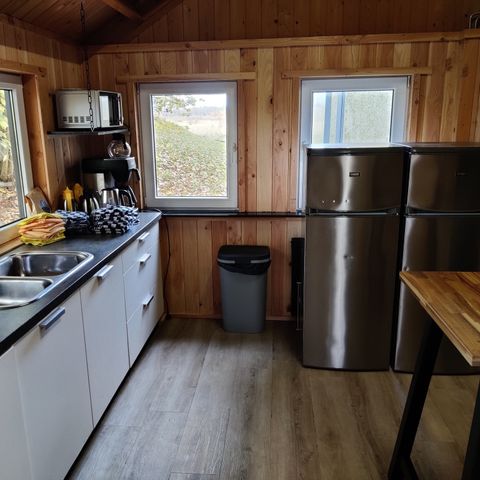 Tiny house 16 personen - Gruppenunterkunft Blockhaus + 4 Vier-Personen-Tiny Houses (16 Personen)