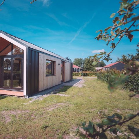 AUßERGEWÖHNLICHE UNTERKUNFT 24 Personen - Gruppenraum das Strandhuis + 6 Tiny Houses (24 Personen)