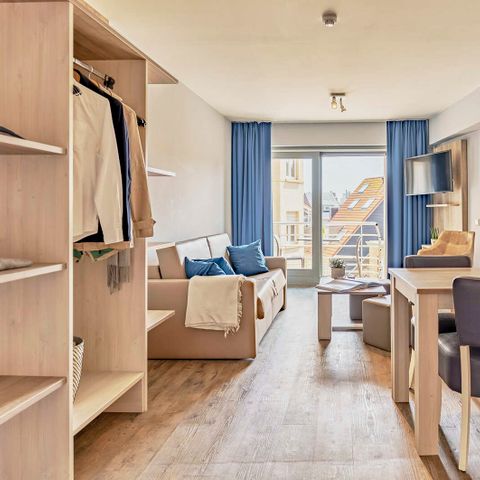 Apartement 4 Personen - Wesentlich | Schlafzimmerecke - Schlafsofa | Balkon - Stadtblick