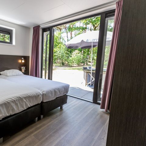 Bungalow 4 Personen - Forest Lodge 75 mit Whirlpool