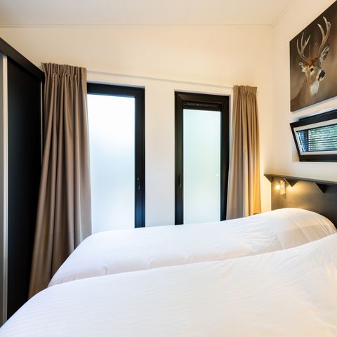 Bungalow 4 Personen - Forest Lodge 55 Eco mit Whirlpool oder Jacuzzi und Sauna