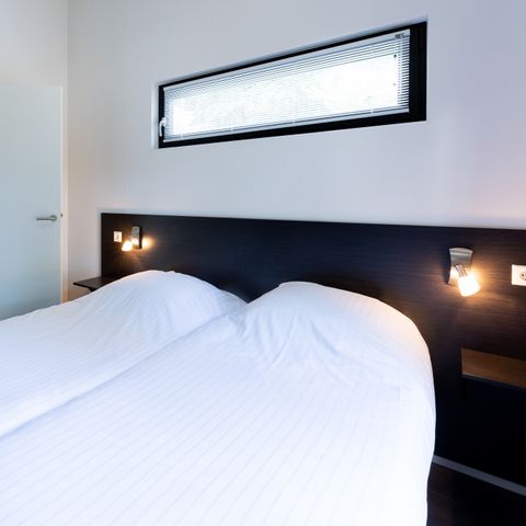 Bungalow 4 Personen - Forest Lodge 55 mit Whirlpool