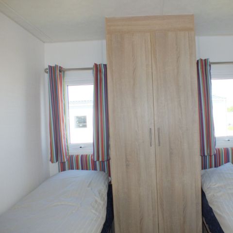 Mobilheim 4 Personen - mit Terrasse am Wasser