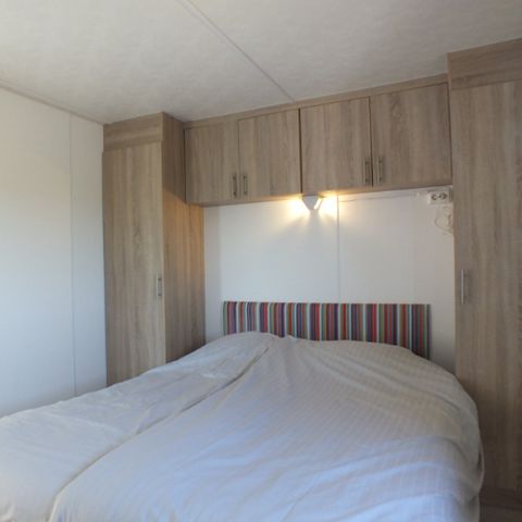 Mobilheim 4 Personen - mit Terrasse am Wasser