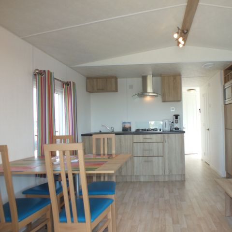 Mobilheim 4 Personen - mit Terrasse am Wasser