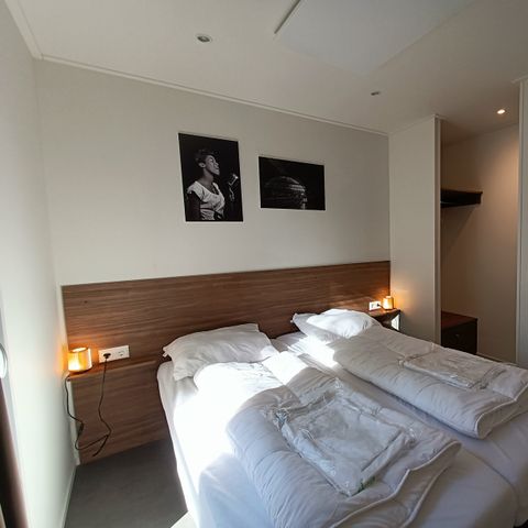 Chalet 6 Personen - L-Cube Whirlpool 4+2