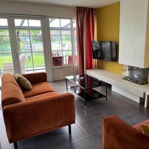Bungalow 5 Personen - mit luxuriösem Gartenzimmer und Blick auf den Spielteich